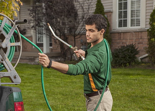 Weed Man technician performing Insect Control application